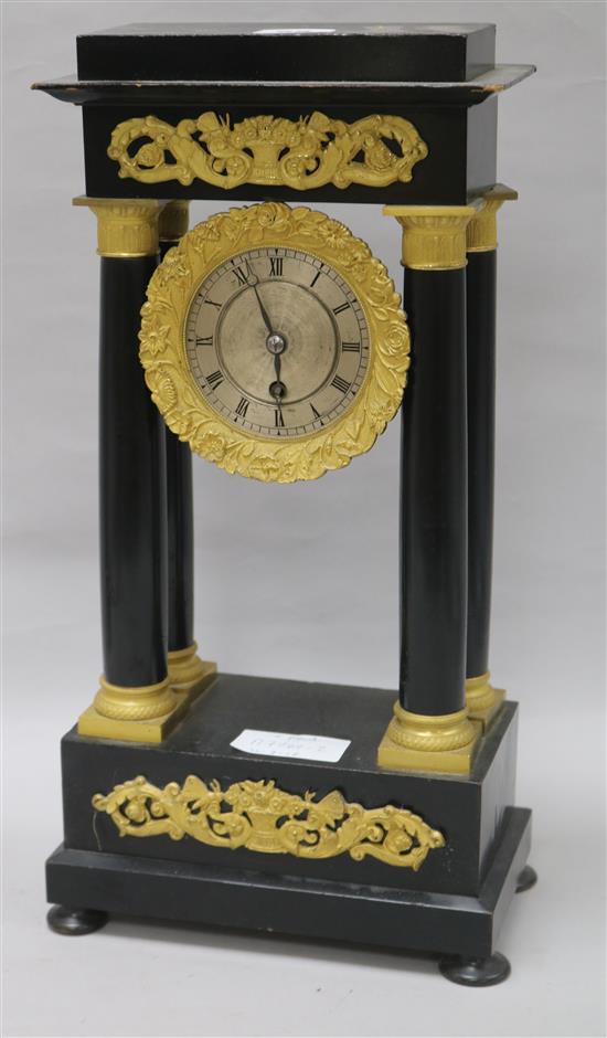 A portico clock and pendulum height 40.5cm